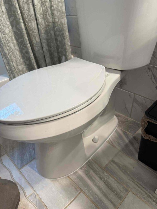 Responded to service call for two toilets leaking at the base. Inspected both fixtures and identified failed wax ring seals causing water seepage onto bathroom flooring. Removed toilets from floor flanges, scraped and cleaned old wax residue from flange surfaces and toilet bases. Installed new wax rings with proper compression and reset toilets with secure mounting. Checked water supply connections and shut-off valves for proper operation. Tested both toilets through multiple flush cycles to verify leak elimination and confirm proper sealing at base. Left work area clean with all fixtures functioning properly and no active leaks present.