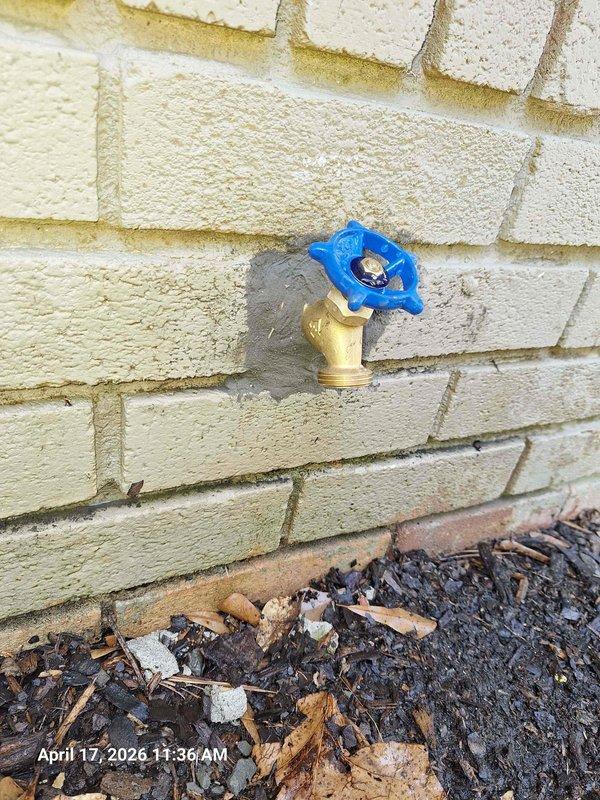 Responded to service call for non-functional exterior hose bibb. Upon arrival, performed comprehensive assessment of outdoor water spigot mounted on exterior wall with blue handle valve. Conducted thorough inspection of fixture, wall penetration point, and surrounding area to identify root cause of malfunction. Examined interior wall cavity behind hose bibb location, which revealed significant water damage to drywall and structural deterioration at ceiling-wall junction. Documented extensive damage including compromised drywall, exposed framing, and evidence of long-term moisture intrusion. Photographed both exterior spigot condition and interior water damage for detailed assessment. Provided professional evaluation and free estimate for necessary repairs to restore proper function and address underlying water damage issues. Responded to service call for non-functional exterior hose bibb. Upon arrival, performed comprehensive assessment of outdoor water spigot mounted on exterior wall with blue handle valve. Conducted thorough inspection of fixture, wall penetration point, and surrounding area to identify root cause of malfunction. Examined interior wall cavity behind hose bibb location, which revealed significant water damage to drywall and structural deterioration at ceiling-wall junction. Documented extensive damage including compromised drywall, exposed framing, and evidence of long-term moisture intrusion. Photographed both exterior spigot condition and interior water damage for detailed assessment. Provided professional evaluation and free estimate for necessary repairs to restore proper function and address underlying water damage issues.