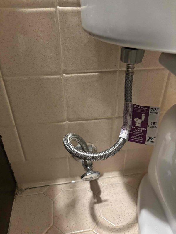 Responded to a plumbing repair call for a leaking toilet with issues at the wall connection and shut-off valve. Upon inspection, identified the water supply line and shut-off valve as the source of the leak. Replaced the existing flexible braided metal supply line with a new 16-inch stainless steel braided supply line featuring 7/8" and 3/8" compression fittings. Installed new shut-off valve at the wall connection point to resolve the malfunctioning shut-off knob. Verified proper connections at both the wall stub-out and toilet tank inlet, ensuring compression fittings were properly tightened to prevent future leaks. Tested the system by turning water supply back on and cycling the toilet multiple times to confirm no leaks were present at either connection point. Verified water pressure was within normal operating parameters and shut-off valve functioned properly with smooth operation. Left installation clean with all old components removed from the premises. Responded to a plumbing repair call for a leaking toilet with issues at the wall connection and shut-off valve. Upon inspection, identified the water supply line and shut-off valve as the source of the leak. Replaced the existing flexible braided metal supply line with a new 16-inch stainless steel braided supply line featuring 7/8" and 3/8" compression fittings. Installed new shut-off valve at the wall connection point to resolve the malfunctioning shut-off knob. Verified proper connections at both the wall stub-out and toilet tank inlet, ensuring compression fittings were properly tightened to prevent future leaks. Tested the system by turning water supply back on and cycling the toilet multiple times to confirm no leaks were present at either connection point. Verified water pressure was within normal operating parameters and shut-off valve functioned properly with smooth operation. Left installation clean with all old components removed from the premises.