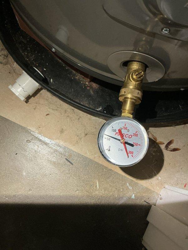 Responded to isolated low water pressure complaint affecting hot water supply in multiple bathrooms. Upon inspection, discovered significant frost accumulation on copper piping within mechanical cabinet, indicating potential temperature-pressure relationship issue. Measured system pressure at water heater using calibrated gauge, documenting baseline readings at tank connection point. Frost buildup on supply lines suggests possible expansion tank malfunction or thermal transfer problem affecting hot water distribution. Photographically documented conditions for reference and recommended further evaluation of pressure reducing valve, expansion tank functionality, and potential sediment accumulation in affected fixture supply lines causing localized pressure restriction. Responded to isolated low water pressure complaint affecting hot water supply in multiple bathrooms. Upon inspection, discovered significant frost accumulation on copper piping within mechanical cabinet, indicating potential temperature-pressure relationship issue. Measured system pressure at water heater using calibrated gauge, documenting baseline readings at tank connection point. Frost buildup on supply lines suggests possible expansion tank malfunction or thermal transfer problem affecting hot water distribution. Photographically documented conditions for reference and recommended further evaluation of pressure reducing valve, expansion tank functionality, and potential sediment accumulation in affected fixture supply lines causing localized pressure restriction.