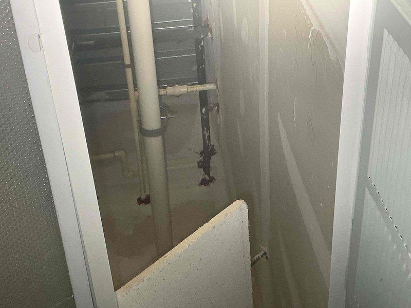 Provided estimate for installation of wireless remote water meter box and refrigerator waterline connection from existing wall faucet. Assessed sewer odor issue in rear of unit, documenting existing plumbing infrastructure including gray PVC drainage system and utility piping configurations in mechanical area. Provided estimate for installation of wireless remote water meter box and refrigerator waterline connection from existing wall faucet. Assessed sewer odor issue in rear of unit, documenting existing plumbing infrastructure including gray PVC drainage system and utility piping configurations in mechanical area.