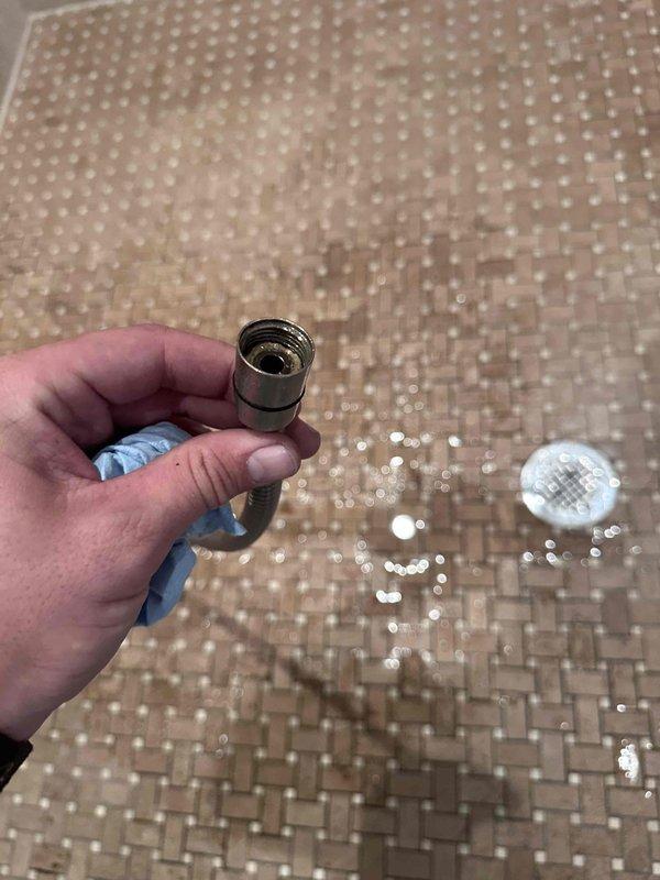 Responded to service call for leaking shower with mobility and stability issues. Upon inspection, accessed plumbing fixture behind wall to diagnose source of leak. Identified compromised shower valve assembly and loose supply line connections contributing to water leakage. Removed defective braided supply hose and cross-fitting valve assembly. Replaced faulty components with new fixtures, ensuring proper threading and secure connections at all attachment points. Verified water-tight seal and tested shower operation to confirm leak was resolved and fixture stability restored. Responded to service call for leaking shower with mobility and stability issues. Upon inspection, accessed plumbing fixture behind wall to diagnose source of leak. Identified compromised shower valve assembly and loose supply line connections contributing to water leakage. Removed defective braided supply hose and cross-fitting valve assembly. Replaced faulty components with new fixtures, ensuring proper threading and secure connections at all attachment points. Verified water-tight seal and tested shower operation to confirm leak was resolved and fixture stability restored.