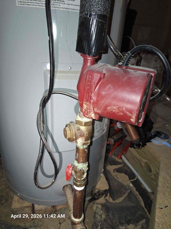 # Pressure Issue Resolution
Responded to multiple shower pressure and operational concerns throughout the residence. Inspected hot water circulation system and identified corroded brass fittings with significant mineral buildup affecting water flow. The circulation pump showed signs of age with visible corrosion on connected brass components and copper piping.
Addressed non-functional shower head in double shower head installation. Investigated low water pressure issue in second bathroom shower, which also presented sewer odor concerns requiring drain system evaluation. Examined third shower experiencing temperature fluctuation problems, likely related to pressure balance valve or hot water circulation system performance.
Documentation revealed heavy mineral deposits and corrosion on brass T-fittings and elbow connections in the hot water circulation assembly. The deterioration of threaded connections and presence of white crusty formations indicated potential water leakage or conde # Pressure Issue Resolution
Responded to multiple shower pressure and operational concerns throughout the residence. Inspected hot water circulation system and identified corroded brass fittings with significant mineral buildup affecting water flow. The circulation pump showed signs of age with visible corrosion on connected brass components and copper piping.
Addressed non-functional shower head in double shower head installation. Investigated low water pressure issue in second bathroom shower, which also presented sewer odor concerns requiring drain system evaluation. Examined third shower experiencing temperature fluctuation problems, likely related to pressure balance valve or hot water circulation system performance.
Documentation revealed heavy mineral deposits and corrosion on brass T-fittings and elbow connections in the hot water circulation assembly. The deterioration of threaded connections and presence of white crusty formations indicated potential water leakage or conde