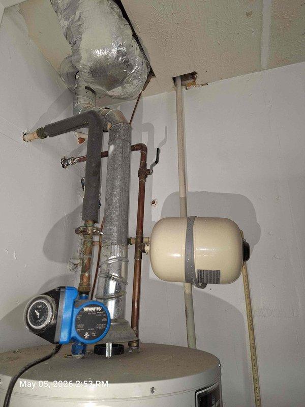 Responded to service call for shower not functioning properly. Upon inspection, diagnosed issue with water circulation system affecting hot water delivery to the shower. Examined plumbing infrastructure including circulation pump, pressure tank, and water heater connections. Verified proper operation of Watts circulation pump and checked all associated piping for potential restrictions or failures. Inspected shower valve assembly and control mechanism in tiled shower enclosure to ensure proper functionality. Tested water flow and temperature regulation at the fixture. Documented existing mechanical systems and shower installation with photographs for service records. Restored shower to proper working condition and confirmed adequate hot water delivery and pressure at the fixture. Responded to service call for shower not functioning properly. Upon inspection, diagnosed issue with water circulation system affecting hot water delivery to the shower. Examined plumbing infrastructure including circulation pump, pressure tank, and water heater connections. Verified proper operation of Watts circulation pump and checked all associated piping for potential restrictions or failures. Inspected shower valve assembly and control mechanism in tiled shower enclosure to ensure proper functionality. Tested water flow and temperature regulation at the fixture. Documented existing mechanical systems and shower installation with photographs for service records. Restored shower to proper working condition and confirmed adequate hot water delivery and pressure at the fixture.