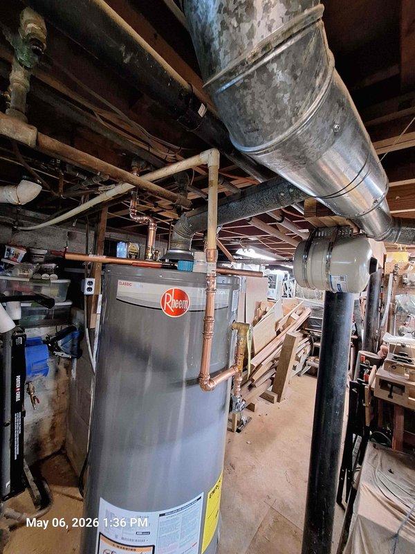 Replaced 40-gallon gas water heater with new Rheem unit and installed pressure relief valve (PRV). Connected all copper supply and discharge piping, verified proper venting through existing galvanized duct system, and tested system pressure to ensure safe operating parameters.