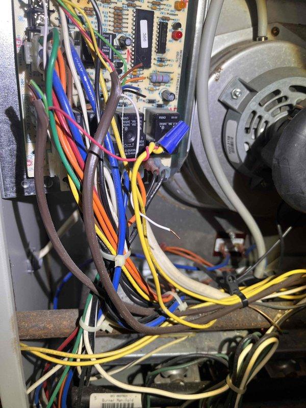 Performed comprehensive second opinion inspection of residential HVAC system per customer concern regarding suboptimal performance. Accessed attic-mounted air handler unit and evaluated control board, motor assembly, wiring connections, and ductwork configuration. Examined electrical components including terminal connections, wire routing, and blower motor operation. Inspected flexible duct system and verified proper installation of supply branches throughout attic space. Documented system condition with detailed photography of control panel interior showing circuit board, capacitors, wire management with appropriate connectors, and blower motor assembly. All major components found to be properly installed with no immediate safety concerns observed at time of inspection. Performed comprehensive second opinion inspection of residential HVAC system per customer concern regarding suboptimal performance. Accessed attic-mounted air handler unit and evaluated control board, motor assembly, wiring connections, and ductwork configuration. Examined electrical components including terminal connections, wire routing, and blower motor operation. Inspected flexible duct system and verified proper installation of supply branches throughout attic space. Documented system condition with detailed photography of control panel interior showing circuit board, capacitors, wire management with appropriate connectors, and blower motor assembly. All major components found to be properly installed with no immediate safety concerns observed at time of inspection.