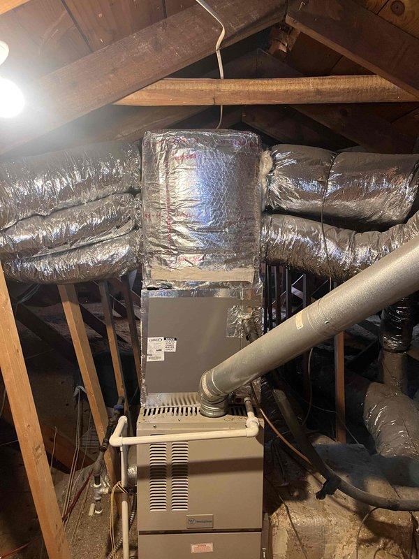 Performed comprehensive second opinion inspection of residential HVAC system per customer concern regarding suboptimal performance. Accessed attic-mounted air handler unit and evaluated control board, motor assembly, wiring connections, and ductwork configuration. Examined electrical components including terminal connections, wire routing, and blower motor operation. Inspected flexible duct system and verified proper installation of supply branches throughout attic space. Documented system condition with detailed photography of control panel interior showing circuit board, capacitors, wire management with appropriate connectors, and blower motor assembly. All major components found to be properly installed with no immediate safety concerns observed at time of inspection. Performed comprehensive second opinion inspection of residential HVAC system per customer concern regarding suboptimal performance. Accessed attic-mounted air handler unit and evaluated control board, motor assembly, wiring connections, and ductwork configuration. Examined electrical components including terminal connections, wire routing, and blower motor operation. Inspected flexible duct system and verified proper installation of supply branches throughout attic space. Documented system condition with detailed photography of control panel interior showing circuit board, capacitors, wire management with appropriate connectors, and blower motor assembly. All major components found to be properly installed with no immediate safety concerns observed at time of inspection.