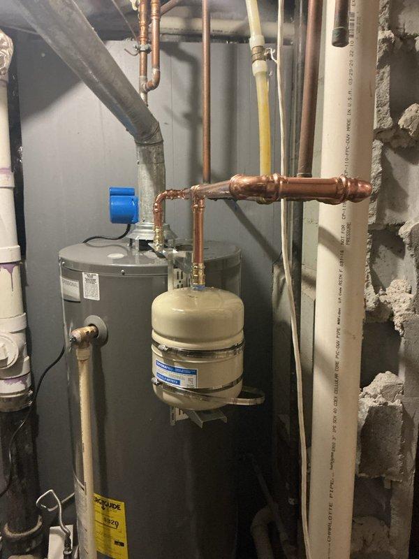Responded to emergency call for basement flooding. Upon arrival, identified failed ball valve on aging galvanized water supply line as the source of the leak. Shut off main water supply to stop active flooding, extracted standing water from basement floor, and replaced the compromised valve with new brass ball valve. Inspected surrounding plumbing infrastructure including water heater, expansion tank, and associated copper piping for additional damage or wear. Tested all connections for proper operation and verified no additional leaks present before restoring water service to the residence. Responded to emergency call for basement flooding. Upon arrival, identified failed ball valve on aging galvanized water supply line as the source of the leak. Shut off main water supply to stop active flooding, extracted standing water from basement floor, and replaced the compromised valve with new brass ball valve. Inspected surrounding plumbing infrastructure including water heater, expansion tank, and associated copper piping for additional damage or wear. Tested all connections for proper operation and verified no additional leaks present before restoring water service to the residence.