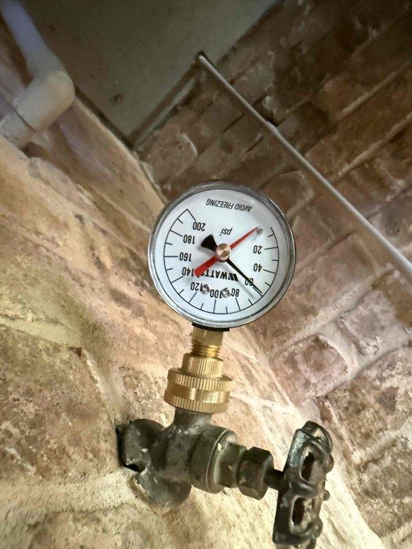 Completed tankless water heater replacement with full system integration. Removed existing unit and installed new Energy Star certified tankless water heater with comprehensive copper piping network, brass fittings, and multiple shut-off valves with blue handles for isolation capability. Integrated yellow flexible gas lines into the plumbing configuration, established electrical connections, and verified proper pressure readings on system gauge. All connections tested and operational. Completed tankless water heater replacement with full system integration. Removed existing unit and installed new Energy Star certified tankless water heater with comprehensive copper piping network, brass fittings, and multiple shut-off valves with blue handles for isolation capability. Integrated yellow flexible gas lines into the plumbing configuration, established electrical connections, and verified proper pressure readings on system gauge. All connections tested and operational.