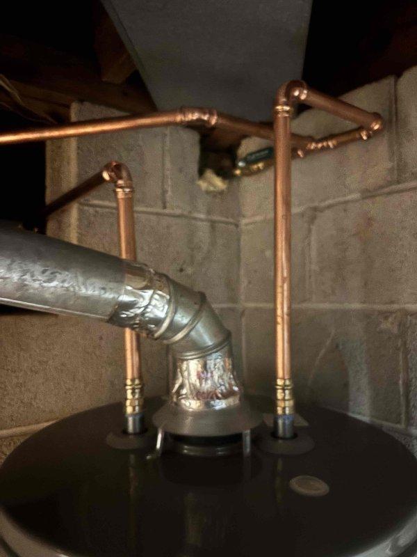 Installed 40-gallon gas water heater in basement utility area per previously provided quote. Connected copper supply lines with proper fittings and mounting brackets, installed flexible yellow gas connector line, and secured all plumbing connections to code. Unit is a Rheem Professional series model, properly vented and operational. Installed 40-gallon gas water heater in basement utility area per previously provided quote. Connected copper supply lines with proper fittings and mounting brackets, installed flexible yellow gas connector line, and secured all plumbing connections to code. Unit is a Rheem Professional series model, properly vented and operational.