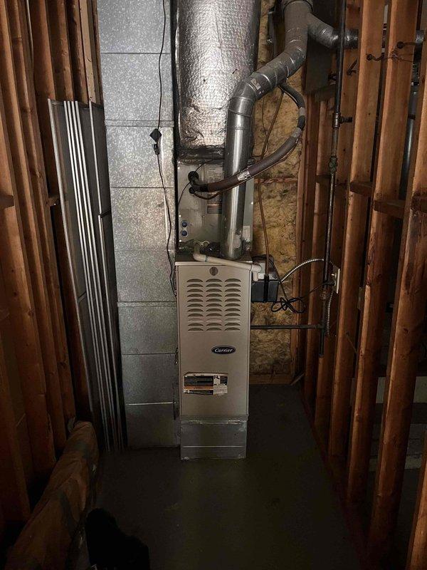 Performed comprehensive second opinion evaluation of residential HVAC system following reports of potential refrigerant leak from another contractor. Inspected Carrier furnace unit located in basement mechanical room and air handler installed in attic space. Connected manifold gauges to air handler to assess refrigerant pressures and system performance. Examined all accessible refrigerant lines, connections, and components for signs of leakage or damage. Evaluated ductwork connections, insulation integrity, and overall system installation quality. Documented equipment condition and findings with photographs for customer reference.