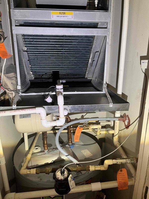 Completed complimentary system tune-up on residential HVAC unit. Performed comprehensive inspection of furnace and air handler assembly, including control board wiring connections, blower motor operation, evaporator coil condition, and condensate drainage system. All components found operating within normal parameters; system returned to service with no issues identified.