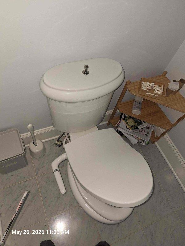 Responded to follow-up service call for malfunctioning toilet after previous rebuild work. Upon arrival, confirmed water supply to toilet had been shut off by customer due to improper operation. Inspected toilet tank assembly and identified defective fill valve component requiring replacement. Removed faulty brass connector fitting and installed new part to restore proper water flow and tank filling function. Tested toilet operation multiple times to verify complete resolution of issue. Left unit in full working order with water supply restored.