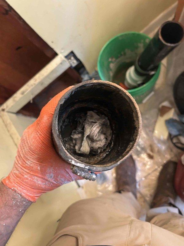 Completed hydro-jetting service to clear severely blocked drain line with heavy scale and sediment buildup visible throughout pipe interior. Installed new pump system with insulated discharge piping, properly sealed wall penetrations, and verified all connections for proper operation and code compliance.