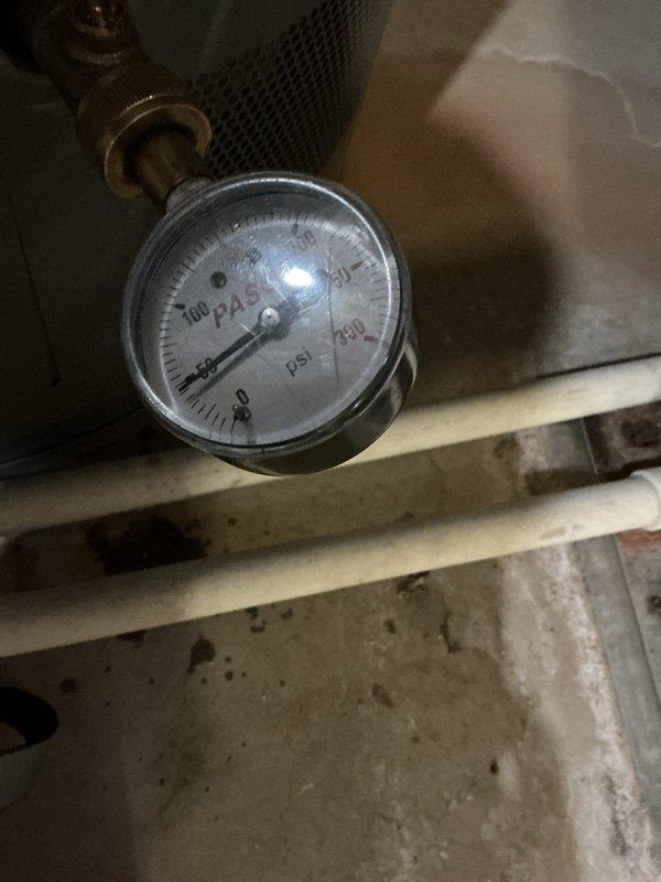 Replaced 20-year-old 50-gallon gas water heater with new unit as part of pre-sale home preparation. New water heater was properly strapped and secured to wooden framing per code requirements, with all gas connections and pressure tested to verify safe operation.