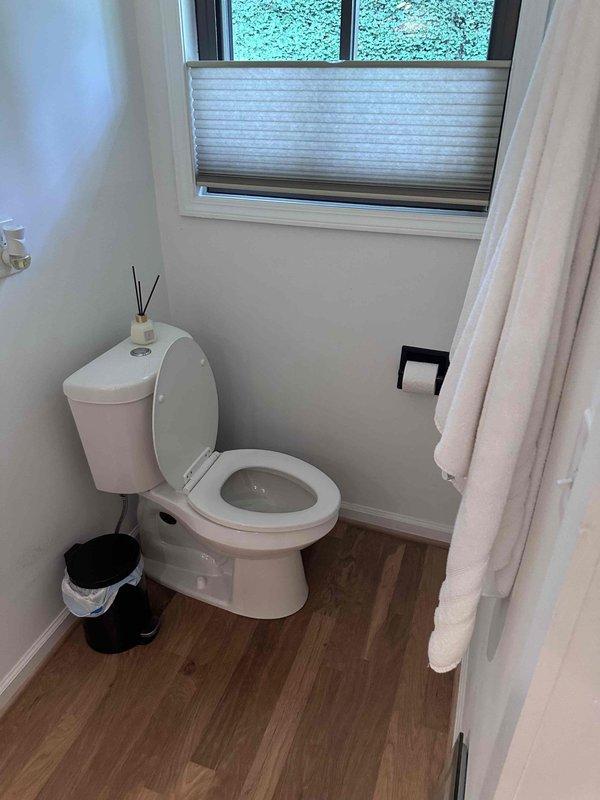 Responded to customer report of slab leak at residential property. Conducted thorough visual inspection of bathroom areas, including vanity, toilet, flooring, and surrounding fixtures to identify source of moisture intrusion. Documented conditions with photographs for service records, but no active leak was visible during inspection time, suggesting intermittent issue requiring further monitoring or additional diagnostic equipment to pinpoint exact location within slab.
