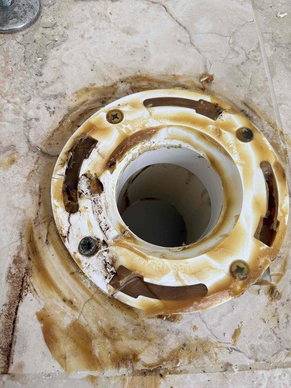 Installed customer-supplied toilet in bathroom corner, connecting water supply line and ensuring proper seal at floor flange. Completed installation with all plumbing connections secured and fixture tested for proper operation and leak-free performance.