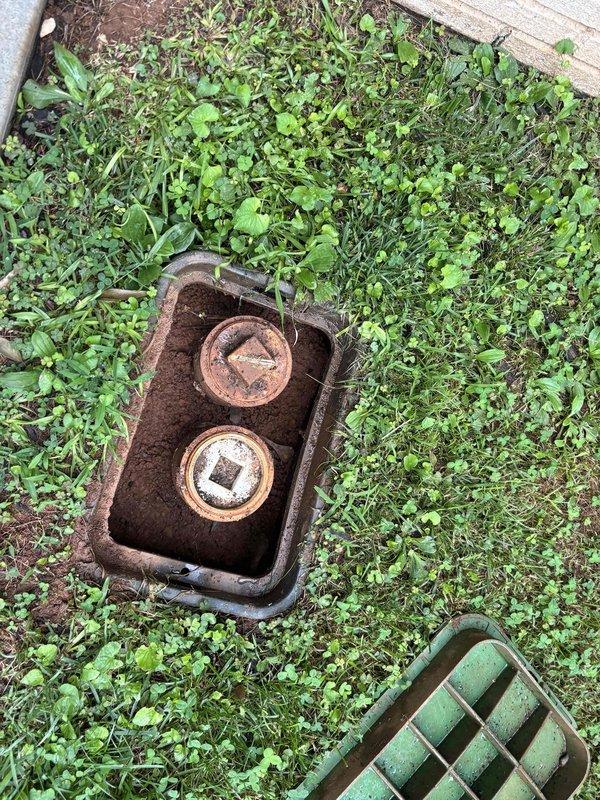 Performed sewer scope inspection from exterior cleanout access point located in ground-level utility box. Documented cleanout location and system access point with photographic evidence for customer records.