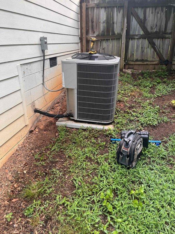 Completed comprehensive HVAC system maintenance including inspection of outdoor condenser unit and interior ductwork system. Verified proper installation and integrity of flexible duct insulation in attic space, confirmed secure mounting straps, and assessed refrigerant line connections at exterior unit. All components found in satisfactory operating condition with no immediate service needs identified.