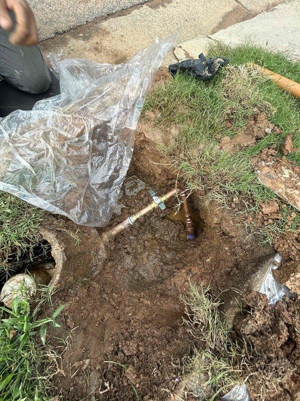 Responded to water service line leak located near meter assembly. City utility department had previously confirmed leak was on customer's side of system. Excavated affected area to expose copper service line and shutoff valve assembly. Located active leak point on water service piping. Isolated water supply and performed necessary repairs to copper line and brass fittings. Verified system integrity and restored water service. Backfilled excavation and restored ground surface upon completion.