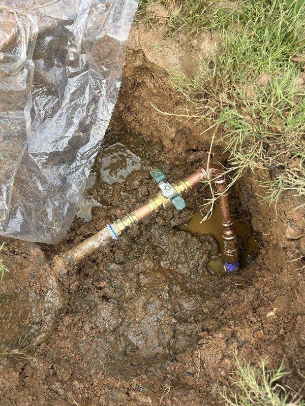 Responded to water service line leak located near meter assembly. City utility department had previously confirmed leak was on customer's side of system. Excavated affected area to expose copper service line and shutoff valve assembly. Located active leak point on water service piping. Isolated water supply and performed necessary repairs to copper line and brass fittings. Verified system integrity and restored water service. Backfilled excavation and restored ground surface upon completion.