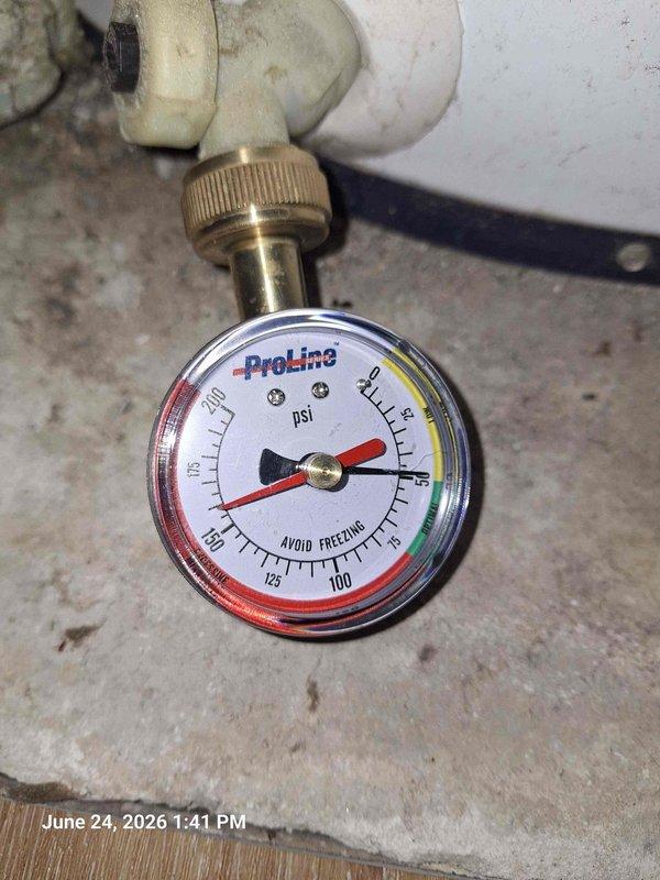 Replaced faulty thermal expansion tank and 3/4" valve on water heater system. Installed new pressure gauge and verified proper system pressure readings within safe operating range. Completed all copper pipe connections and secured fixtures through wall opening, ensuring leak-free operation and code-compliant installation.