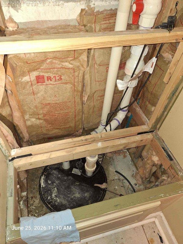 Responded to basement toilet leak. Upon inspection, discovered leaking wax ring at toilet flange connection allowing water to seep through floor into crawlspace below. Removed toilet, replaced failed wax ring and closet bolts, reinstalled toilet with proper seal, and verified all connections were secure and leak-free. Inspected surrounding plumbing lines and sump pump system for additional issues, confirmed all other components functioning properly with no signs of water damage to floor joists or insulation.