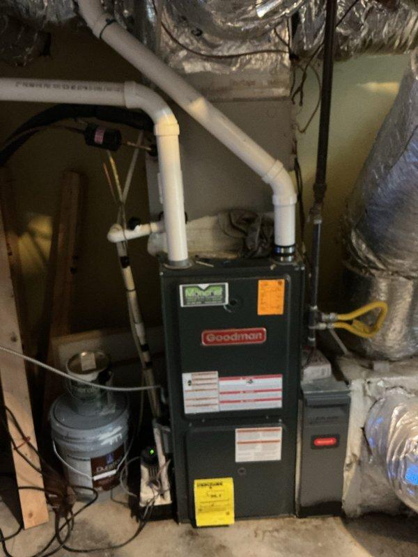 Performed sewer scope inspection at property with accessible cleanout. Camera inspection revealed standard residential sewer line conditions with no immediate blockages or structural concerns identified during the evaluation. Documentation completed with photographic records of basement utility area showing water heater, HVAC system, and plumbing infrastructure for customer reference.