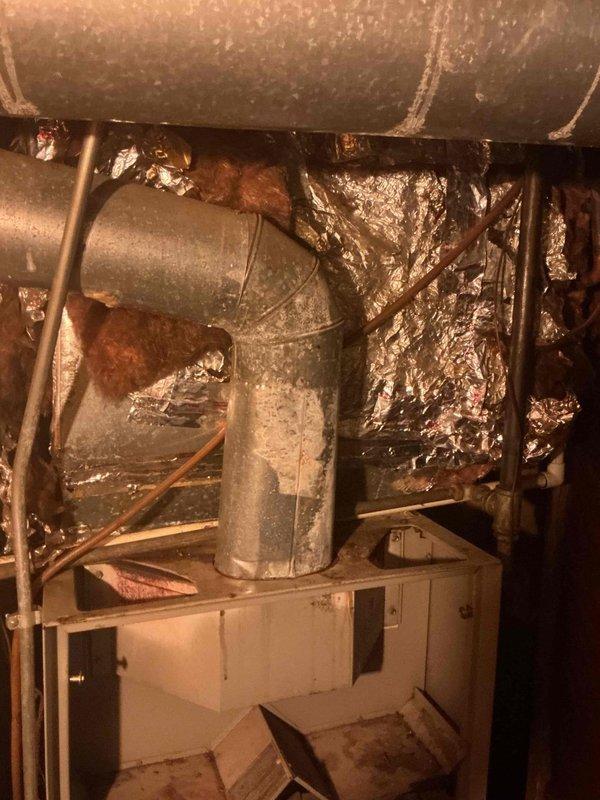 Responded to no cooling call where outdoor condensing unit was not operating while indoor air handler was functioning. Upon arrival, inspected outdoor unit located in latticed enclosure beneath deck. Found unit completely inoperative with no power to compressor or condenser fan motor. Tested electrical connections at disconnect and verified incoming voltage present. Traced power supply through control circuit and identified failed contactor preventing unit from energizing. Replaced defective contactor and confirmed proper voltage delivery to compressor and fan motor. Cycled system multiple times to verify reliable operation. Outdoor unit now operating normally with proper amperage draw on both compressor and condenser fan. System cooling effectively with indoor and outdoor units communicating properly. Cleared work area and restored unit to full operational status.