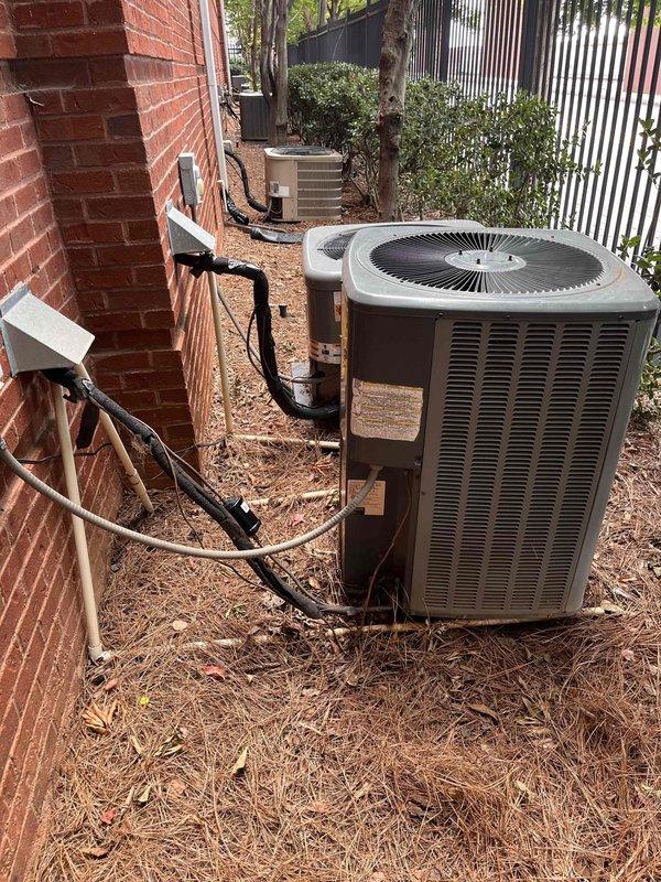 Completed comprehensive HVAC system restoration on residential outdoor condensing unit. Replaced failed evaporator coil assembly showing significant corrosion and aging on copper refrigerant lines. Installed new capacitor and contactor to restore proper electrical operation and compressor functionality. Performed complete system service including refrigerant line inspection, electrical connection verification, and operational testing. All components now functioning within manufacturer specifications with proper airflow and cooling capacity restored.