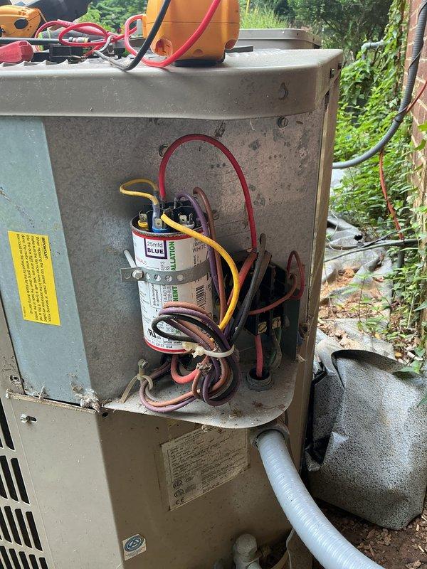 Responded to service call for dual-system HVAC concern regarding outdoor unit operation. Performed diagnostic evaluation of both systems, including inspection of indoor furnace equipment and outdoor condensing units. Tested electrical components including capacitors and contactor operation on outdoor unit using multimeter. Verified gas line connections, ductwork configuration, and overall system functionality. Unable to complete full diagnostic due to lack of thermostat control at time of service visit.