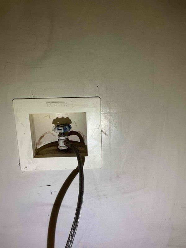 Installed water supply line connection to refrigerator utilizing existing wall-mounted access panel with shut-off valve. Connected braided supply line from valve to refrigerator ice maker/water dispenser, ensuring proper fitting installation and leak-free operation. Installed water supply line connection to refrigerator utilizing existing wall-mounted access panel with shut-off valve. Connected braided supply line from valve to refrigerator ice maker/water dispenser, ensuring proper fitting installation and leak-free operation.