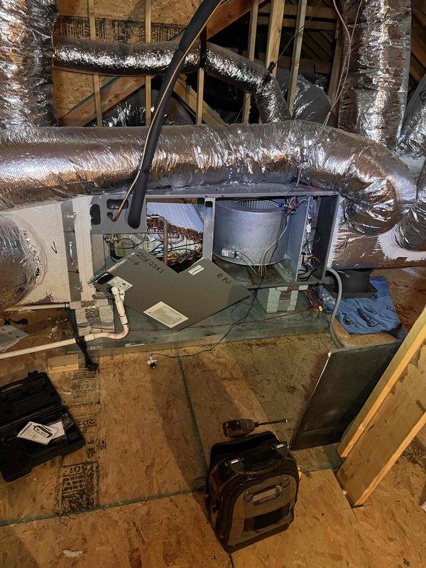 Responded to service call for attic-mounted HVAC system with reported water leak. Upon inspection, located air handler unit in attic space and examined condensate drain system including visible PVC drain lines. Performed diagnostic testing of system components using megohmmeter to verify electrical integrity of equipment, with readings indicating acceptable resistance levels in the safe operating range. Inspected flexible ductwork, air handler platform, and surrounding area for signs of active leakage or water damage. Documented system condition with photos for service records and provided customer with maintenance program information for ongoing preventive care. Responded to service call for attic-mounted HVAC system with reported water leak. Upon inspection, located air handler unit in attic space and examined condensate drain system including visible PVC drain lines. Performed diagnostic testing of system components using megohmmeter to verify electrical integrity of equipment, with readings indicating acceptable resistance levels in the safe operating range. Inspected flexible ductwork, air handler platform, and surrounding area for signs of active leakage or water damage. Documented system condition with photos for service records and provided customer with maintenance program information for ongoing preventive care.