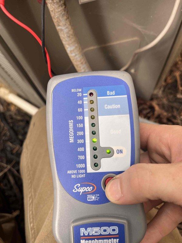 Responded to service call for attic-mounted HVAC system with reported water leak. Upon inspection, located air handler unit in attic space and examined condensate drain system including visible PVC drain lines. Performed diagnostic testing of system components using megohmmeter to verify electrical integrity of equipment, with readings indicating acceptable resistance levels in the safe operating range. Inspected flexible ductwork, air handler platform, and surrounding area for signs of active leakage or water damage. Documented system condition with photos for service records and provided customer with maintenance program information for ongoing preventive care. Responded to service call for attic-mounted HVAC system with reported water leak. Upon inspection, located air handler unit in attic space and examined condensate drain system including visible PVC drain lines. Performed diagnostic testing of system components using megohmmeter to verify electrical integrity of equipment, with readings indicating acceptable resistance levels in the safe operating range. Inspected flexible ductwork, air handler platform, and surrounding area for signs of active leakage or water damage. Documented system condition with photos for service records and provided customer with maintenance program information for ongoing preventive care.