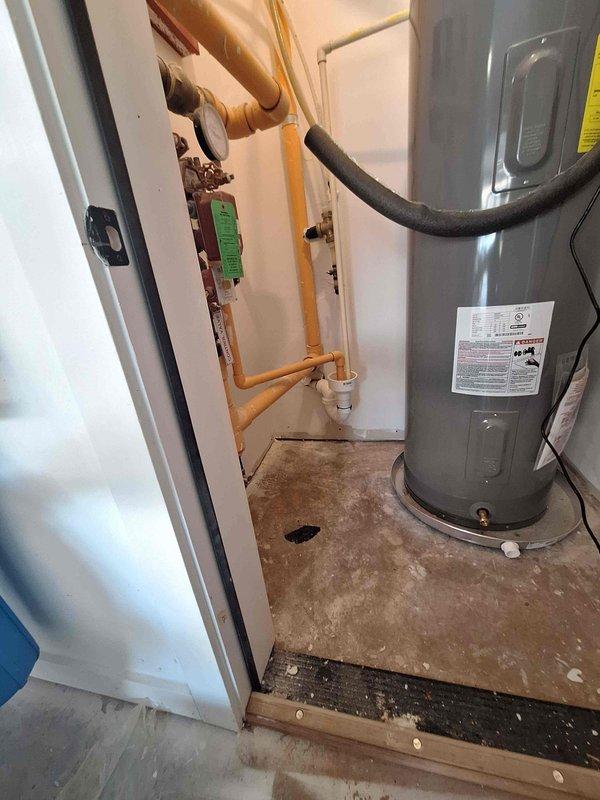 Installed water pressure booster pump system in utility room to address low water pressure issues. Connected booster pump to existing copper plumbing lines, integrated with water heater and filtration system, and tested all connections for proper operation and pressure output. Installed water pressure booster pump system in utility room to address low water pressure issues. Connected booster pump to existing copper plumbing lines, integrated with water heater and filtration system, and tested all connections for proper operation and pressure output.