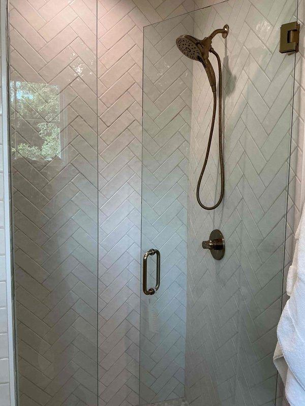 Dunwoody, GA - Responded to customer report of dripping from shower cartridge. Upon inspection, identified leak at the mixing valve control in the tiled shower enclosure. Replaced faulty cartridge assembly in the bronze-finished shower valve, tested system for proper operation and verified leak was eliminated. Dunwoody, GA - Responded to customer report of dripping from shower cartridge. Upon inspection, identified leak at the mixing valve control in the tiled shower enclosure. Replaced faulty cartridge assembly in the bronze-finished shower valve, tested system for proper operation and verified leak was eliminated.