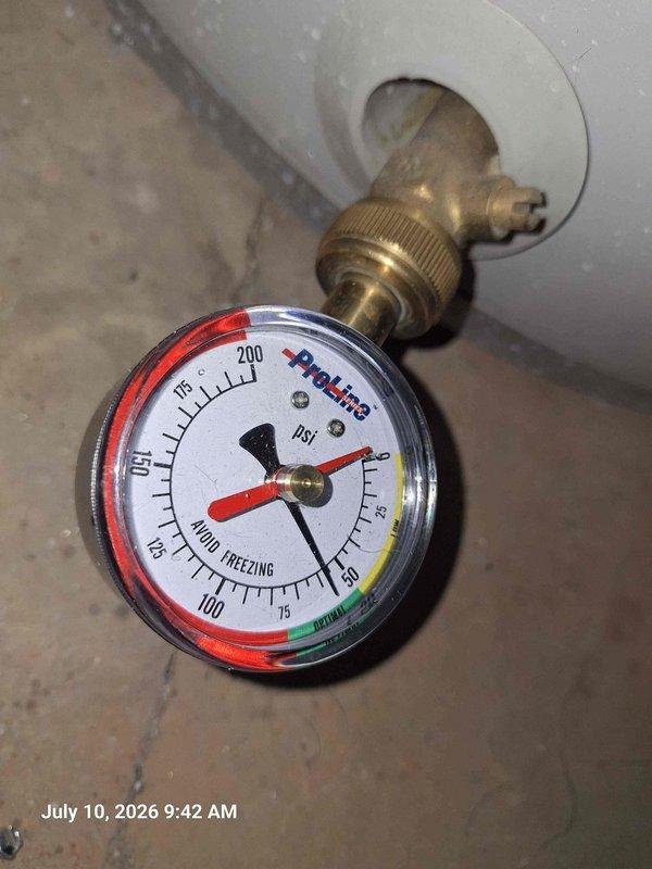 Responded to service call for bathtub not receiving hot water. Upon inspection, discovered low water pressure issue affecting hot water delivery to tub fixtures. Checked pressure gauge on main water line, which indicated readings below normal operating range. Diagnosed and resolved pressure regulation problem at the supply valve. Tested black matte wall-mounted tub spout and diverter handle to verify proper hot water flow and temperature. Confirmed all fixtures operating correctly with adequate pressure and temperature before completing service.