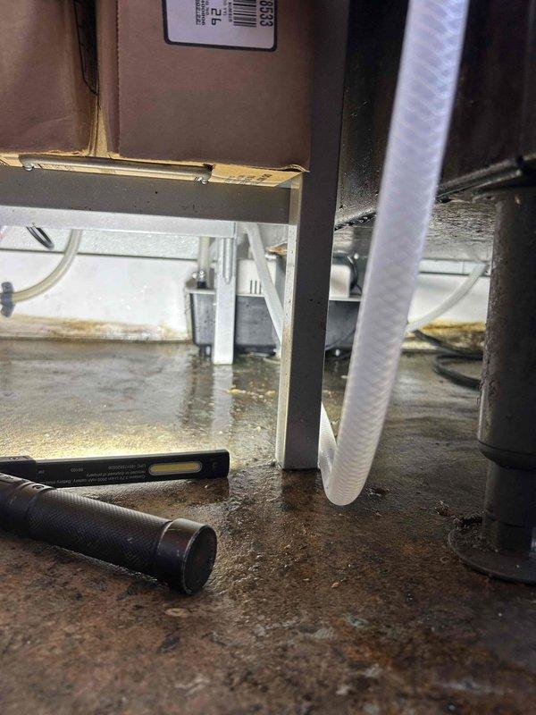 Responded to drain repair service call for HVAC unit. Upon inspection, found water accumulation on concrete floor beneath equipment, indicating drainage system malfunction. Cleared condensate drain line obstruction and verified proper drainage flow. Inspected flexible drain hoses and connections for proper installation and secure fittings. Tested system operation to confirm condensate removal functioning correctly with no further water pooling. Unit returned to normal operation with proper moisture management restored. Responded to drain repair service call for HVAC unit. Upon inspection, found water accumulation on concrete floor beneath equipment, indicating drainage system malfunction. Cleared condensate drain line obstruction and verified proper drainage flow. Inspected flexible drain hoses and connections for proper installation and secure fittings. Tested system operation to confirm condensate removal functioning correctly with no further water pooling. Unit returned to normal operation with proper moisture management restored.