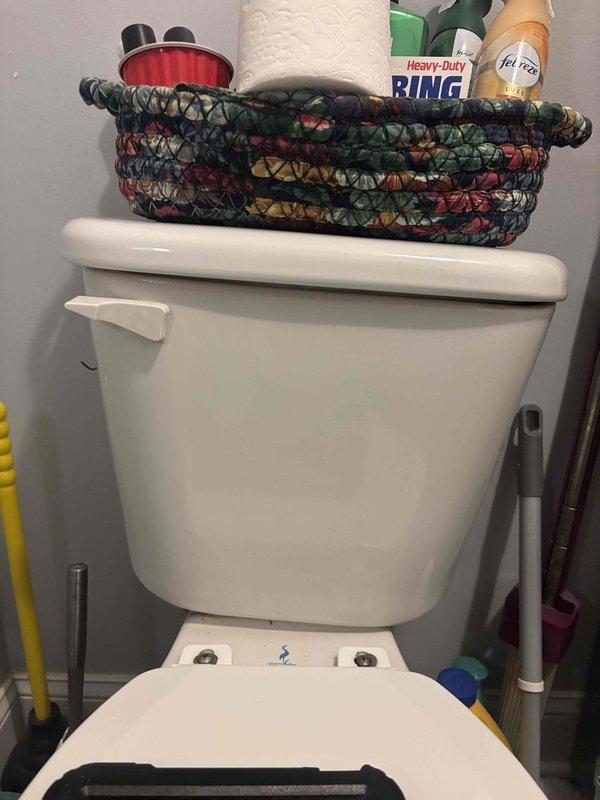 Responded to service call for non-functional toilet with reported leak. Upon arrival, customer indicated they had leaned back against the tank, heard a popping sound, and the toilet stopped working properly. Performed diagnostic inspection of the toilet tank components to identify the source of the malfunction. Documented existing conditions with photographs showing the two-piece residential toilet and surrounding bathroom area. Based on the reported symptoms of a sudden mechanical failure following physical impact to the tank, likely assessed internal flush mechanism components including the fill valve, flush valve, flapper assembly, or potential tank-to-bowl connection issues. Completed necessary repairs to restore proper toilet operation and eliminate the leak condition. Responded to service call for non-functional toilet with reported leak. Upon arrival, customer indicated they had leaned back against the tank, heard a popping sound, and the toilet stopped working properly. Performed diagnostic inspection of the toilet tank components to identify the source of the malfunction. Documented existing conditions with photographs showing the two-piece residential toilet and surrounding bathroom area. Based on the reported symptoms of a sudden mechanical failure following physical impact to the tank, likely assessed internal flush mechanism components including the fill valve, flush valve, flapper assembly, or potential tank-to-bowl connection issues. Completed necessary repairs to restore proper toilet operation and eliminate the leak condition.