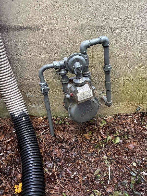 Conducted site evaluation for gas stove conversion, assessing existing gas supply infrastructure and required modifications. Documented current gas line configuration, pipe routing, and connection points to determine scope of work needed for safe appliance conversion. Conducted site evaluation for gas stove conversion, assessing existing gas supply infrastructure and required modifications. Documented current gas line configuration, pipe routing, and connection points to determine scope of work needed for safe appliance conversion.