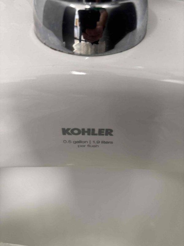 Responded to multiple plumbing issues including sink faucet leaking from handle, base leak on secondary faucet, and malfunctioning sprayer that would not shut off properly. Inspected and serviced men's urinal with slow flushing issue, examining the flush valve assembly and internal components. Documented all fixtures with photographs showing the urinal's 0.5 gallon per flush Kohler system and chrome flush valve mechanism for service records. Responded to multiple plumbing issues including sink faucet leaking from handle, base leak on secondary faucet, and malfunctioning sprayer that would not shut off properly. Inspected and serviced men's urinal with slow flushing issue, examining the flush valve assembly and internal components. Documented all fixtures with photographs showing the urinal's 0.5 gallon per flush Kohler system and chrome flush valve mechanism for service records.
