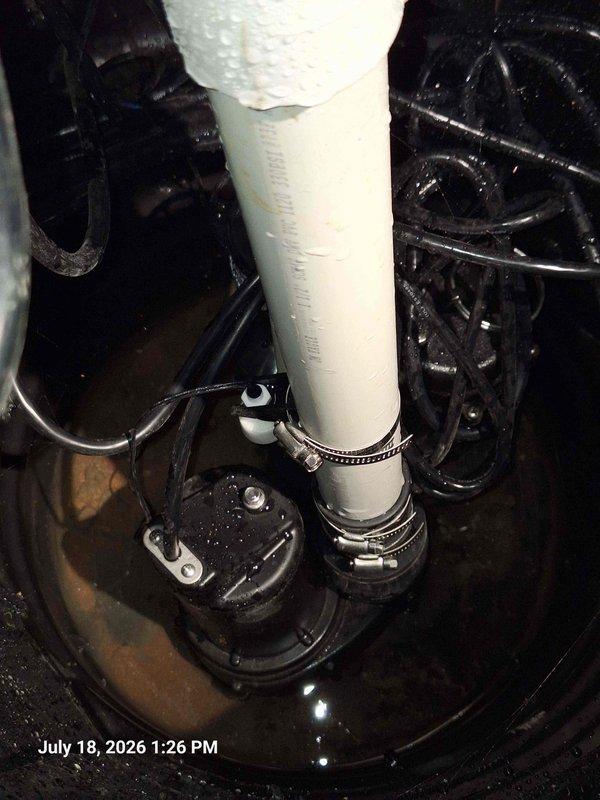 Responded to sump pump alarm activation. Upon inspection, found pressure switch gauge reading in low-pressure range, indicating potential loss of prime or water supply issue. Verified discharge line integrity and confirmed proper pipe insulation installation with secure hose clamps to prevent freezing conditions. System pressure gauge displaying readings within operational parameters after assessment, with all mechanical components and mounting hardware properly secured. Responded to sump pump alarm activation. Upon inspection, found pressure switch gauge reading in low-pressure range, indicating potential loss of prime or water supply issue. Verified discharge line integrity and confirmed proper pipe insulation installation with secure hose clamps to prevent freezing conditions. System pressure gauge displaying readings within operational parameters after assessment, with all mechanical components and mounting hardware properly secured.