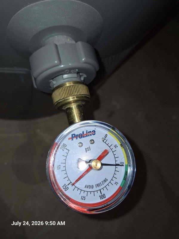 Responded to report of leak in upstairs bathroom occurring during faucet use. Upon investigation, inspected plumbing system including water heater installation, pressure regulation components, and associated piping. Documented existing Rheem Performance water heater with proper warning labels, expansion tank mounting, and connected HVAC ductwork in mechanical space. Verified pressure gauge readings on water system showing measurements within normal operating parameters. Photographed plumbing infrastructure including copper lines with brass fittings, PVC connections, and pressure regulation equipment to establish baseline system conditions for diagnostic purposes. Responded to report of leak in upstairs bathroom occurring during faucet use. Upon investigation, inspected plumbing system including water heater installation, pressure regulation components, and associated piping. Documented existing Rheem Performance water heater with proper warning labels, expansion tank mounting, and connected HVAC ductwork in mechanical space. Verified pressure gauge readings on water system showing measurements within normal operating parameters. Photographed plumbing infrastructure including copper lines with brass fittings, PVC connections, and pressure regulation equipment to establish baseline system conditions for diagnostic purposes.