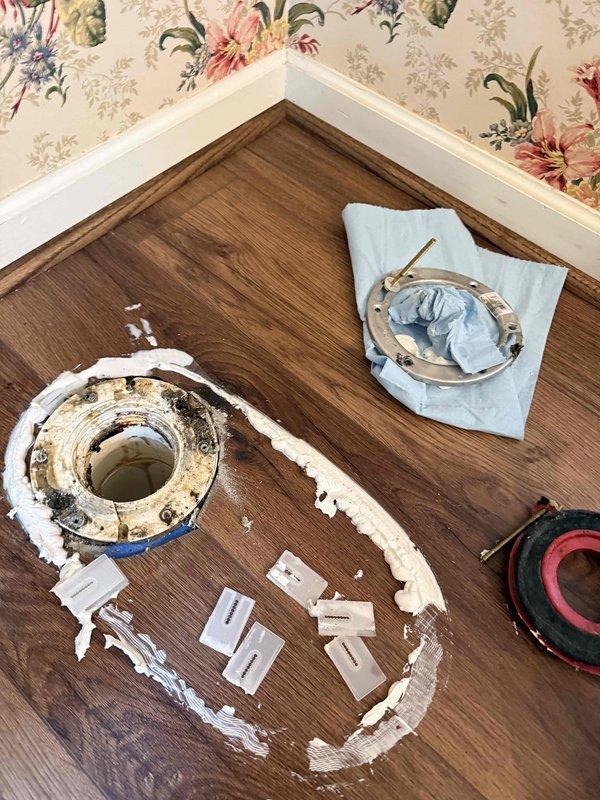 Responded to plumbing emergency where toilet flange failed during customer's flooring installation project, causing active water leak. Removed damaged flange assembly, cleaned and prepped subfloor surface, and installed new code-compliant toilet flange with proper wax ring seal to restore functionality and prevent further water damage to new LVP flooring. Responded to plumbing emergency where toilet flange failed during customer's flooring installation project, causing active water leak. Removed damaged flange assembly, cleaned and prepped subfloor surface, and installed new code-compliant toilet flange with proper wax ring seal to restore functionality and prevent further water damage to new LVP flooring.