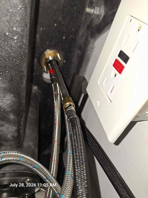 Responded to service call for faucet replacement. Upon arrival, accessed property using provided gate code and conducted assessment of existing plumbing fixtures. Documented pre-existing plumbing connections including flexible braided stainless steel supply lines with brass compression fittings serving hot and cold water distribution. Verified proper GFCI electrical protection present at work location. During inspection, also documented HVAC system condensate pump assembly to ensure no interference with plumbing work. Successfully completed faucet replacement with new fixture installed and all water supply connections properly secured and tested for leaks. All work performed to code specifications. Responded to service call for faucet replacement. Upon arrival, accessed property using provided gate code and conducted assessment of existing plumbing fixtures. Documented pre-existing plumbing connections including flexible braided stainless steel supply lines with brass compression fittings serving hot and cold water distribution. Verified proper GFCI electrical protection present at work location. During inspection, also documented HVAC system condensate pump assembly to ensure no interference with plumbing work. Successfully completed faucet replacement with new fixture installed and all water supply connections properly secured and tested for leaks. All work performed to code specifications.