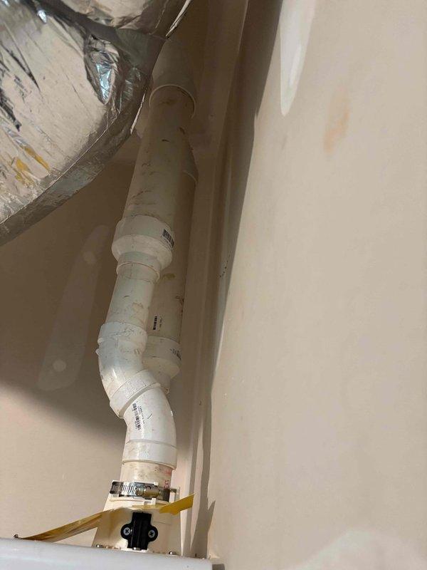 Responded to venting issue code on recently installed Navien tankless water heater. Upon inspection, found improper venting configuration with PVC exhaust pipe installation. Diagnosed fault code related to combustion air flow and exhaust system, adjusted venting components, verified proper clearances, and confirmed unit returned to normal operation with display reading 125°F. Responded to venting issue code on recently installed Navien tankless water heater. Upon inspection, found improper venting configuration with PVC exhaust pipe installation. Diagnosed fault code related to combustion air flow and exhaust system, adjusted venting components, verified proper clearances, and confirmed unit returned to normal operation with display reading 125°F.