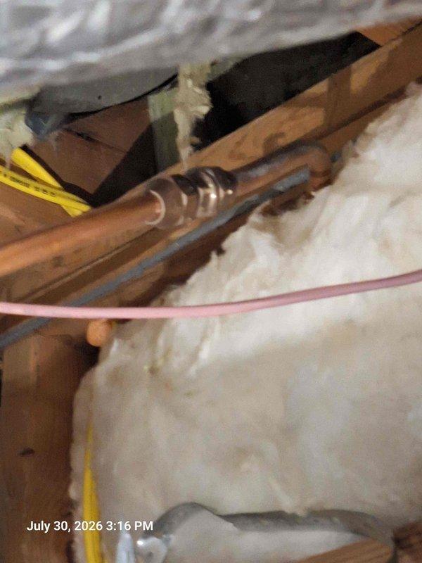 Responded to gas odor complaint and performed comprehensive safety inspection of water heater and gas connections. Inspected Bradford White water heater installation, yellow flexible gas line (CSST), all connection points, and surrounding utility area. Checked gas piping in attic space and verified proper routing of copper lines and gas supply. No active gas leaks detected during inspection. All connections tested and confirmed secure. Water heater operating normally with proper venting and no signs of gas escape at appliance or distribution points. Responded to gas odor complaint and performed comprehensive safety inspection of water heater and gas connections. Inspected Bradford White water heater installation, yellow flexible gas line (CSST), all connection points, and surrounding utility area. Checked gas piping in attic space and verified proper routing of copper lines and gas supply. No active gas leaks detected during inspection. All connections tested and confirmed secure. Water heater operating normally with proper venting and no signs of gas escape at appliance or distribution points.