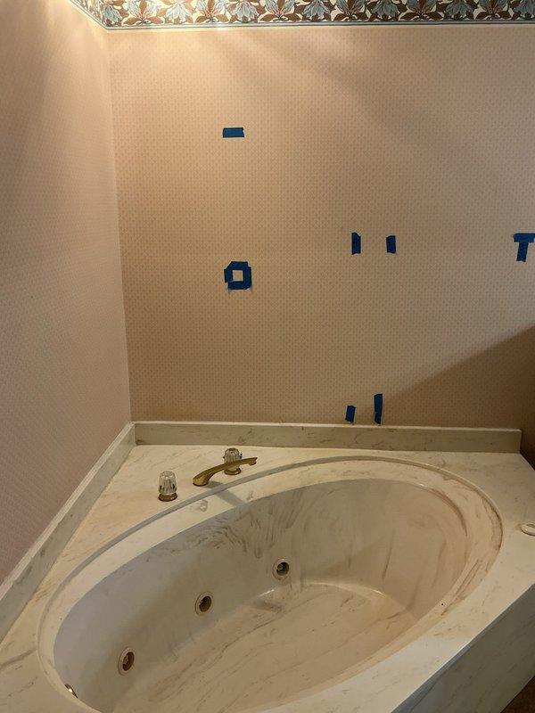 Provided estimate for shower rough-in plumbing installation and toilet drain relocation in bathroom undergoing renovation. Assessed existing bathroom layout featuring whirlpool tub with deck-mounted fixtures and identified access points through attic crawl space above with exposed floor joists for routing new water supply lines and drain piping to accommodate requested plumbing modifications. Provided estimate for shower rough-in plumbing installation and toilet drain relocation in bathroom undergoing renovation. Assessed existing bathroom layout featuring whirlpool tub with deck-mounted fixtures and identified access points through attic crawl space above with exposed floor joists for routing new water supply lines and drain piping to accommodate requested plumbing modifications.