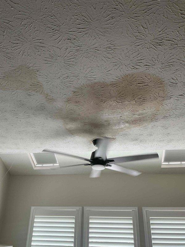 Responded to water leak emergency with water dripping through ceiling from master bathroom above. Inspected plumbing system beneath bathroom floor and identified failed flexible supply line connections at fixture. Customer had already shut off main water supply to prevent further damage. Documented existing water staining on ceiling and compromised supply line installation for repair recommendations. Responded to water leak emergency with water dripping through ceiling from master bathroom above. Inspected plumbing system beneath bathroom floor and identified failed flexible supply line connections at fixture. Customer had already shut off main water supply to prevent further damage. Documented existing water staining on ceiling and compromised supply line installation for repair recommendations.