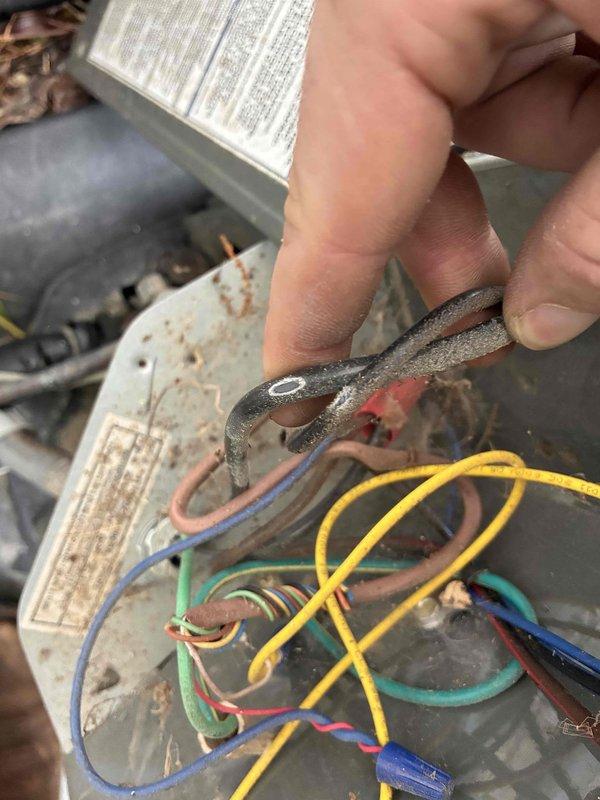 Performed routine HVAC maintenance in residential attic installation. Replaced failed capacitor showing significant corrosion and wear on mounting bracket and electrical connections. Inspected and secured electrical wiring connections, addressing disorganized wire bundling and age-related insulation deterioration. Verified proper operation of system components and confirmed adequate airflow through ductwork. Unit restored to normal operating condition. Performed routine HVAC maintenance in residential attic installation. Replaced failed capacitor showing significant corrosion and wear on mounting bracket and electrical connections. Inspected and secured electrical wiring connections, addressing disorganized wire bundling and age-related insulation deterioration. Verified proper operation of system components and confirmed adequate airflow through ductwork. Unit restored to normal operating condition.